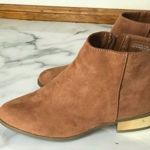 Suede ankle boots with gold tone heel